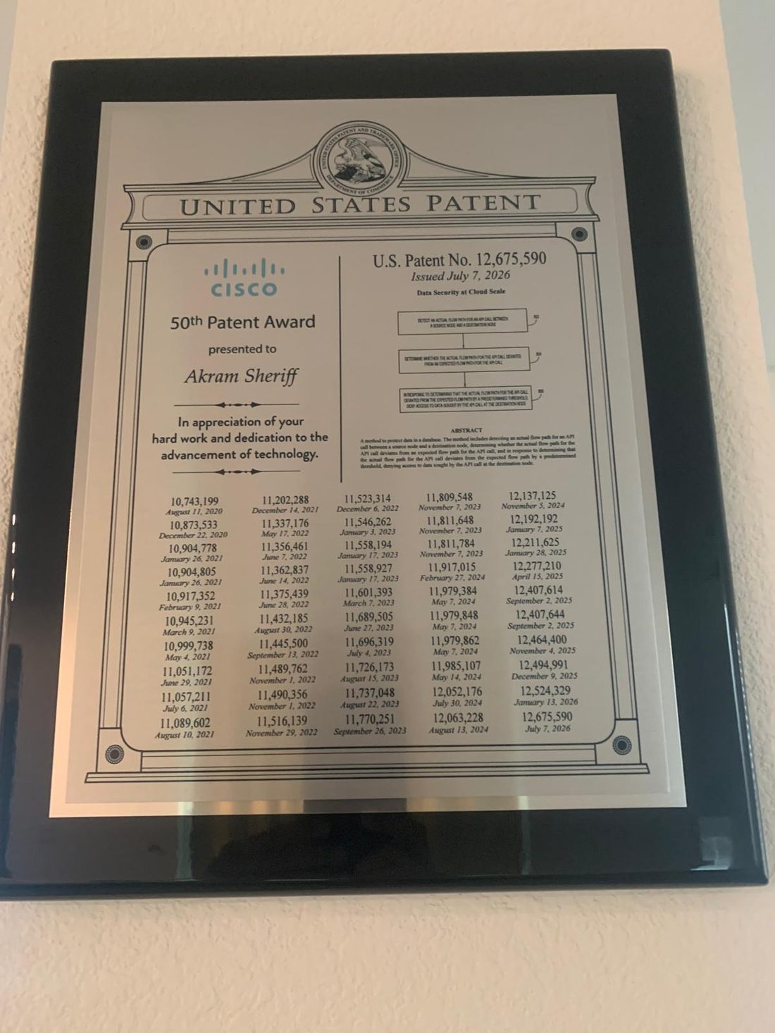 Cisco 50th Patent Award plaque presented to Akram Sheriff