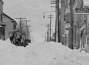 J.T. Miller, plumber, sign on Centre Street, 1914