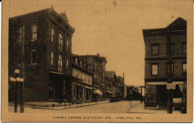 Centre Street at
                Front Street, looking north