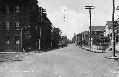 Front and Washington Streets, looking west