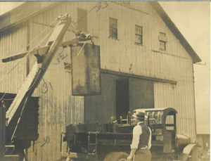 Loading truck with coal containers