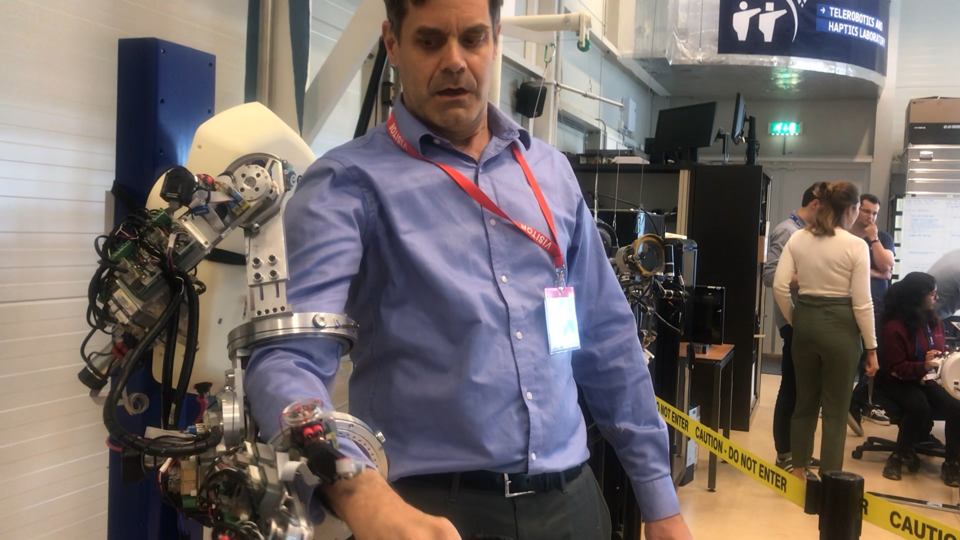 Human wearing exoskeleton