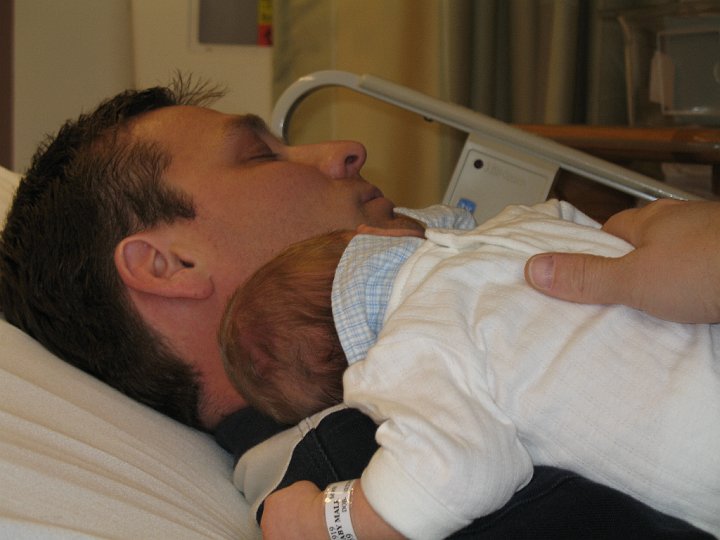 IMG_0892.JPG - Daddy finally gets a nap--with a little help.