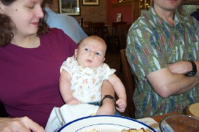 ek_8.jpg - Alexander eats out for the first time.  Or at least watches the rest of us eat.