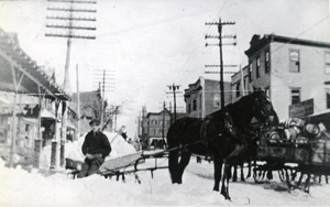 Delivering by horse and sleigh on Centre St.